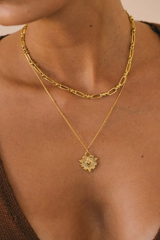 Flaming heart necklace gold plated