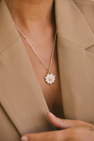 Flaming heart necklace silver