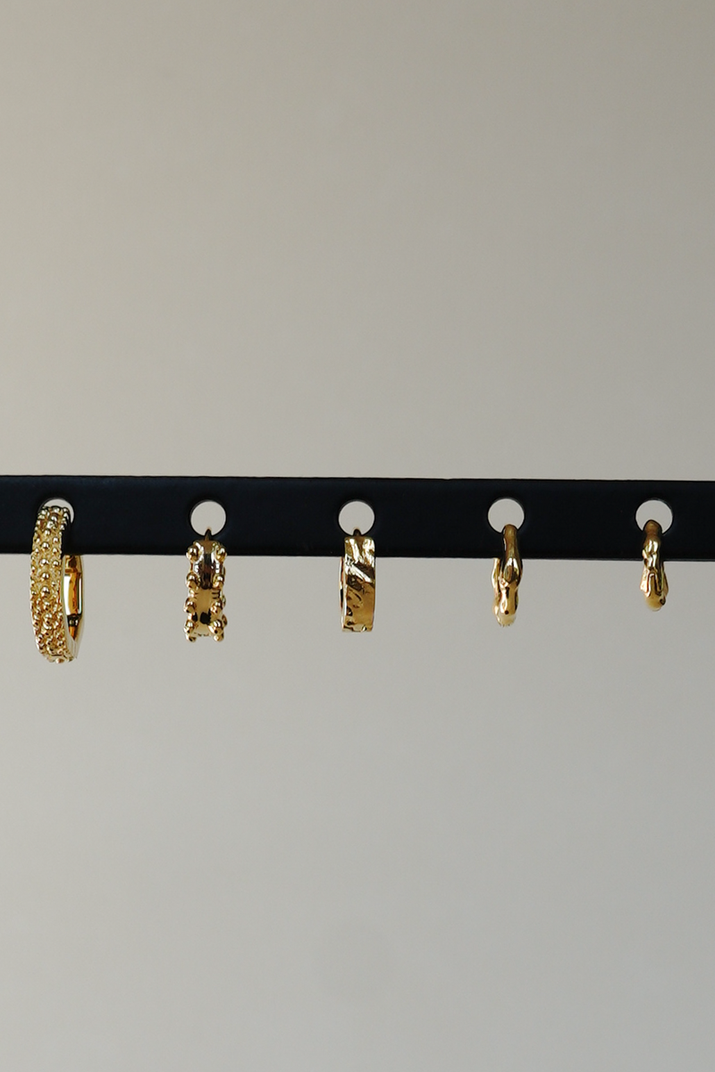 Water ripple huggie gold plated