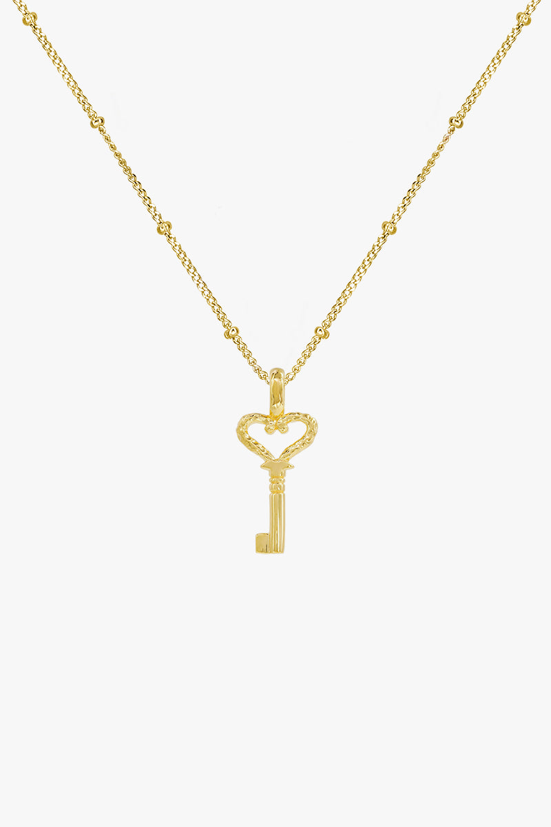Hammered key pendant gold plated