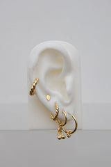 Twisted croissant hoop earring gold plated 13mm