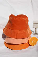 Orange velvet bucket hat