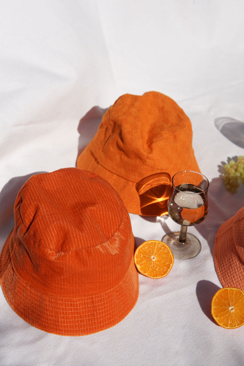 Orange velvet bucket hat